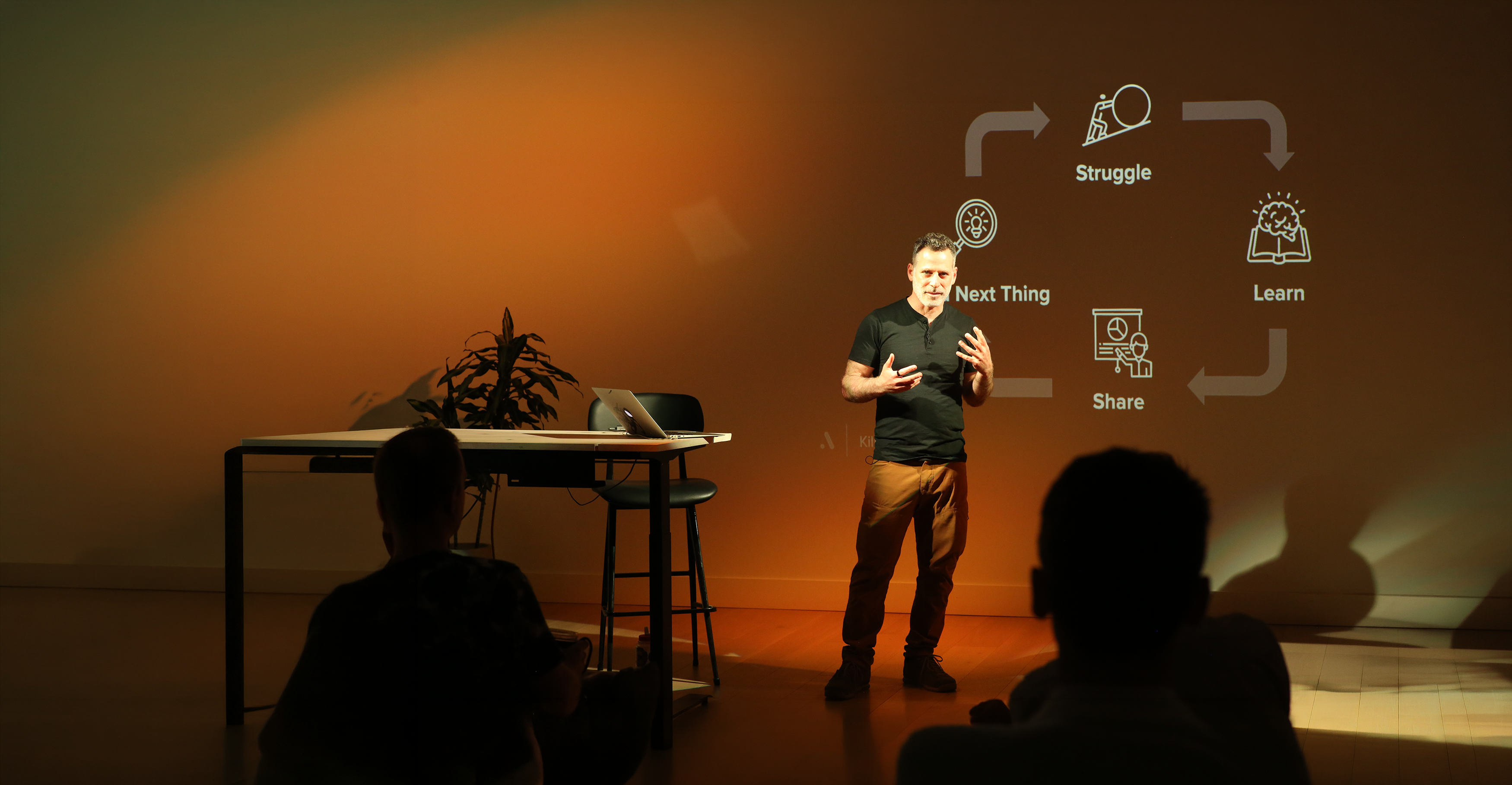 Daniel Burwen speaking on stage